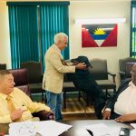 Enigmatic Billionaire Alki David and his genetically cloned Doberman Vader, Visit Antigua’s Government House and Parliament Championing Green Economy and Animal Rights